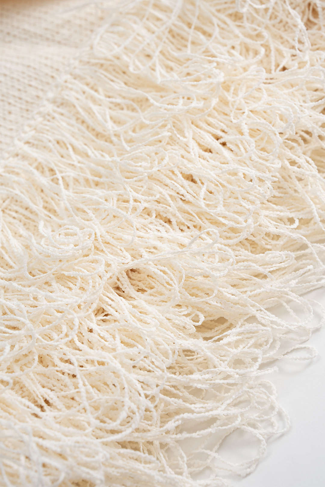 AMARA- Knit Fringe Mini Dress