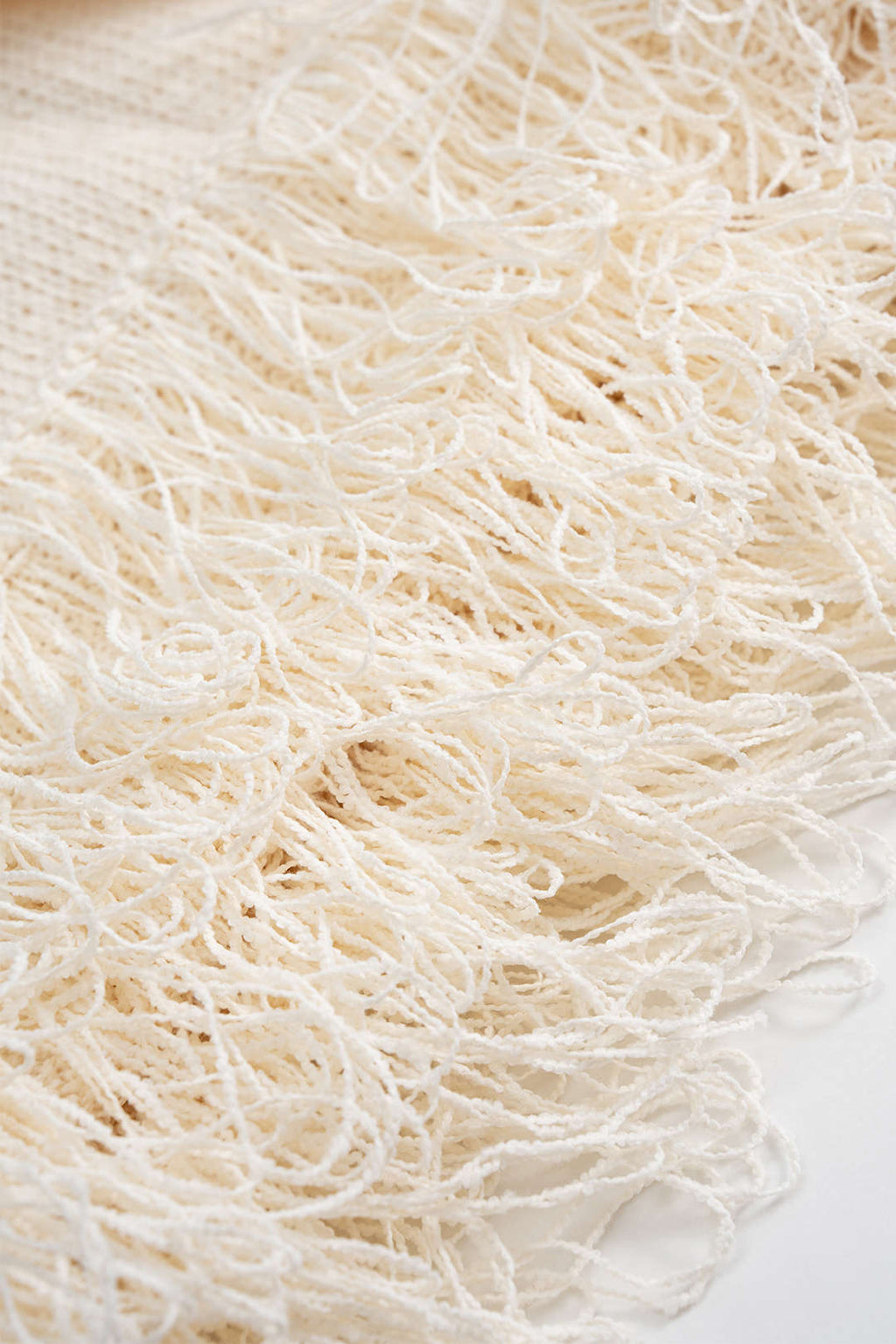AMARA- Knit Fringe Mini Dress